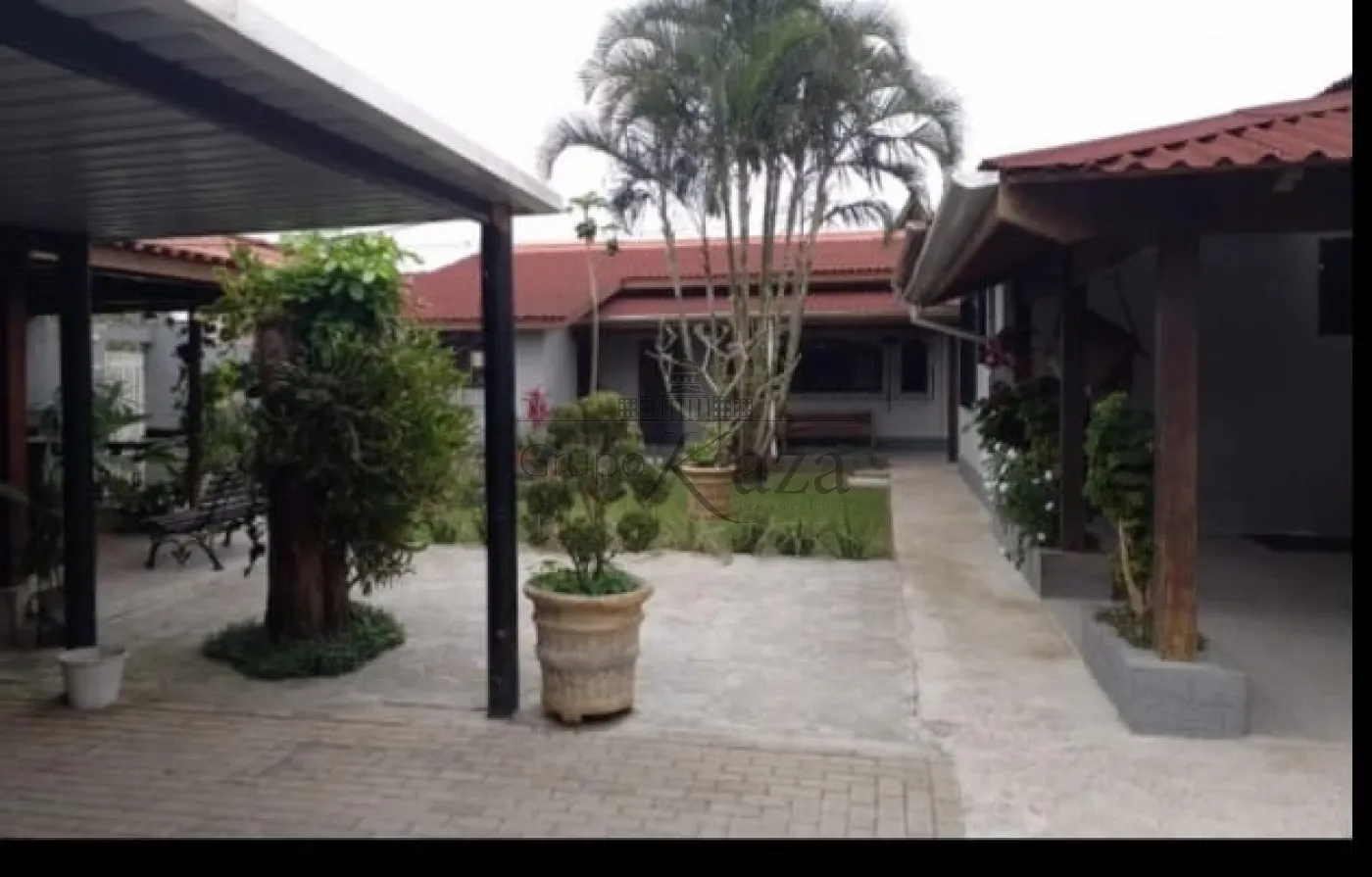 Foto 12 de Casa Padrão em Jardim Mariella, Caraguatatuba - imagem 12
